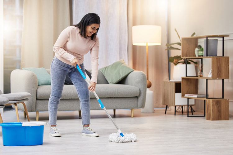 Woman mopping floor