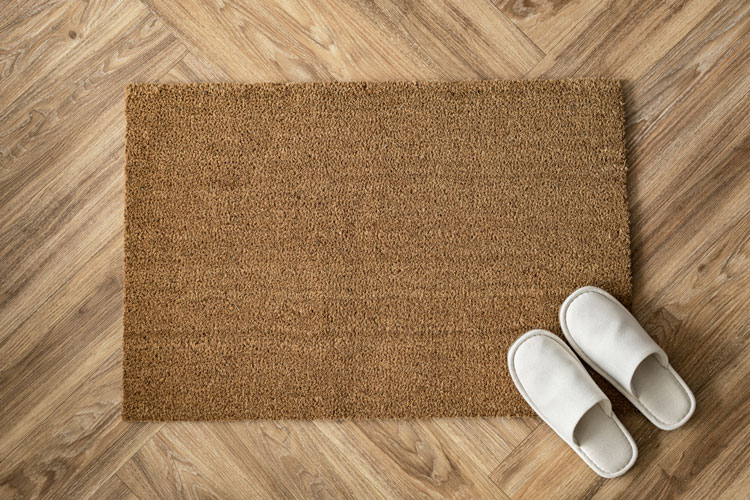 A brown welcome mat