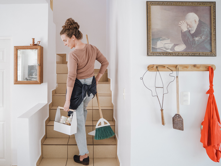 Woman cleaning home